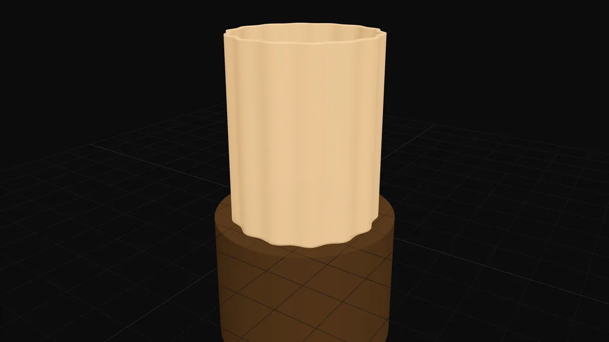 A table lamp with a 3D-printed fluted shade sitting on its laser-cut wooden stand
